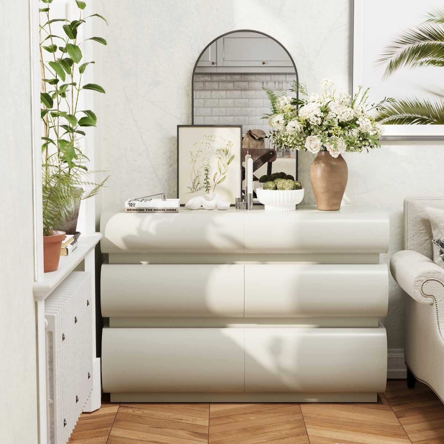 Modern interior with a white console table, mirror, and decorative items.