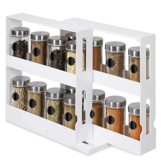 Spice rack with glass jars and metal lids on a white background